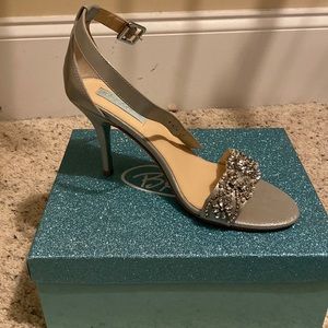 Gray rhinestone shoe with pearls sewed into it